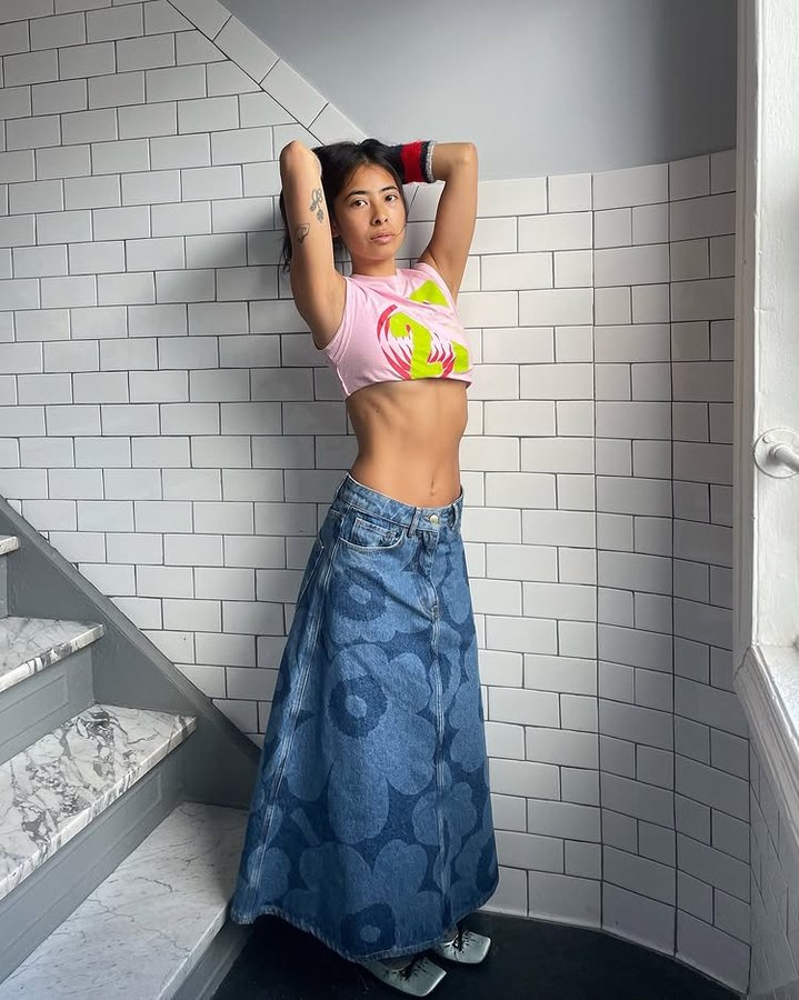 Instagram post by an influencer for Marimekko. Caption reads: manifesting spring with @marimekko maridenim....