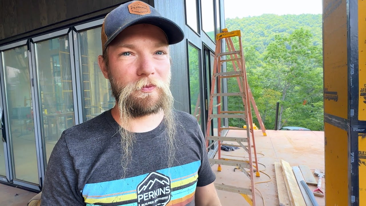 YouTube post by @PerkinsBuilderBrothers for Airbnb. Caption reads: Construction of a MEGA sized Modern Home P102.