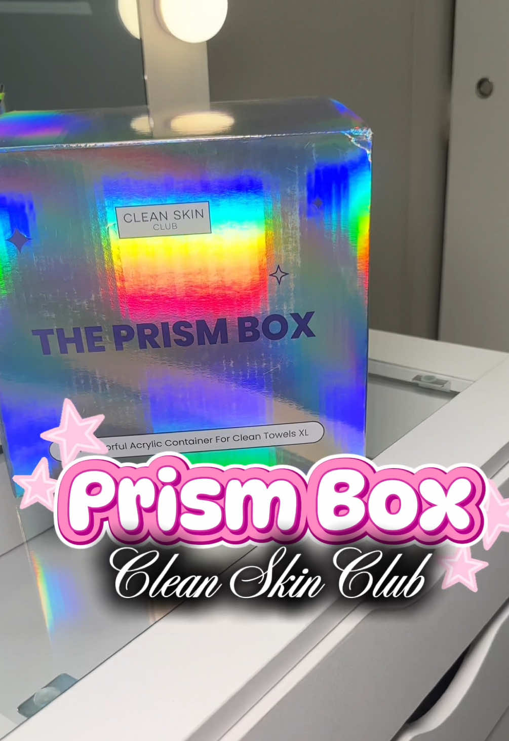 TikTok post by an influencer for Clean Skin Club. Caption reads: [...] Towel Storage Organizer ✨ @Clean Skin Club....