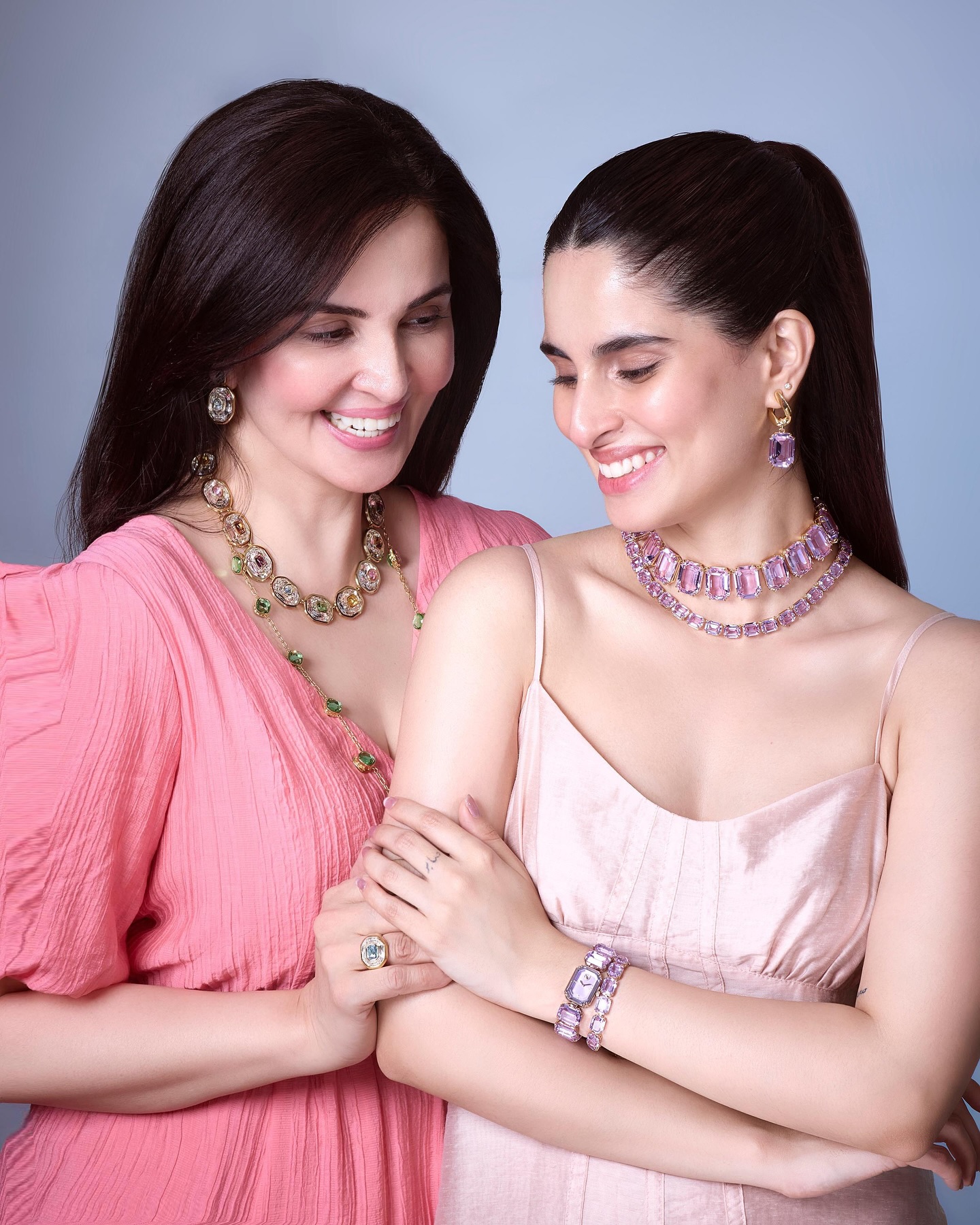 Instagram post by @aisharahmed for SWAROVSKI. Caption reads: Through every phase - the big wins, the quiet....