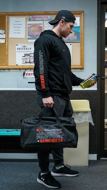 Instagram post by @liftingwith.larry_scoobyhealth for Jacked Factory. Caption reads: Train insane or remain the same 😏 Jacked....