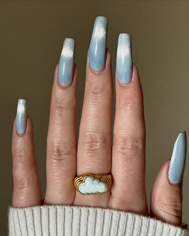 Instagram post by @cozychai.nails for Cracked Polish. Caption reads: Cloud Dancer - @crackedpolish 🩵☁️✨ *paid pr

Here....