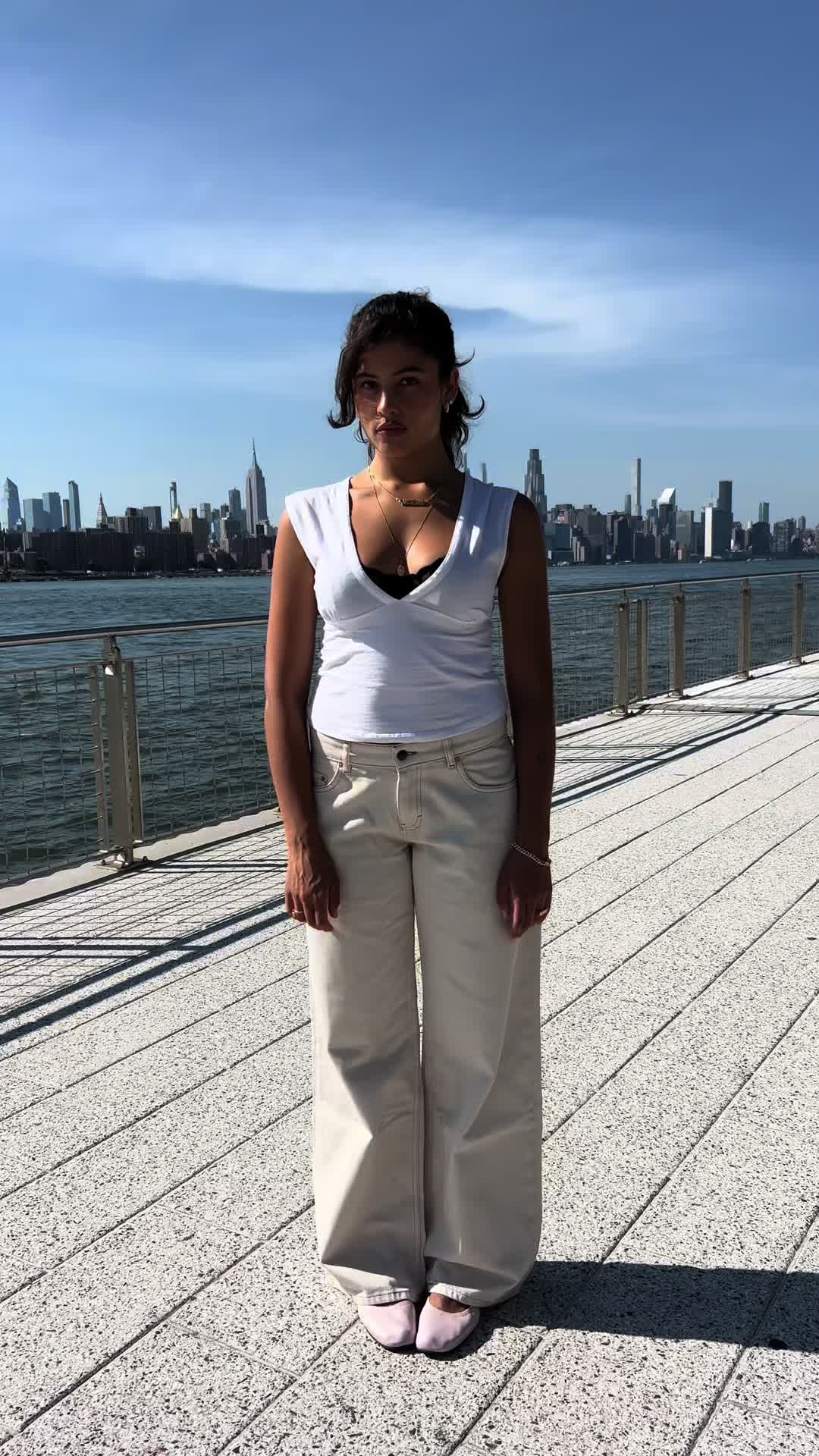 TikTok post by @isabellacarr for Motel Rocks. Caption reads: [...] Jeans in New York #motelperfectpair @MOTEL....