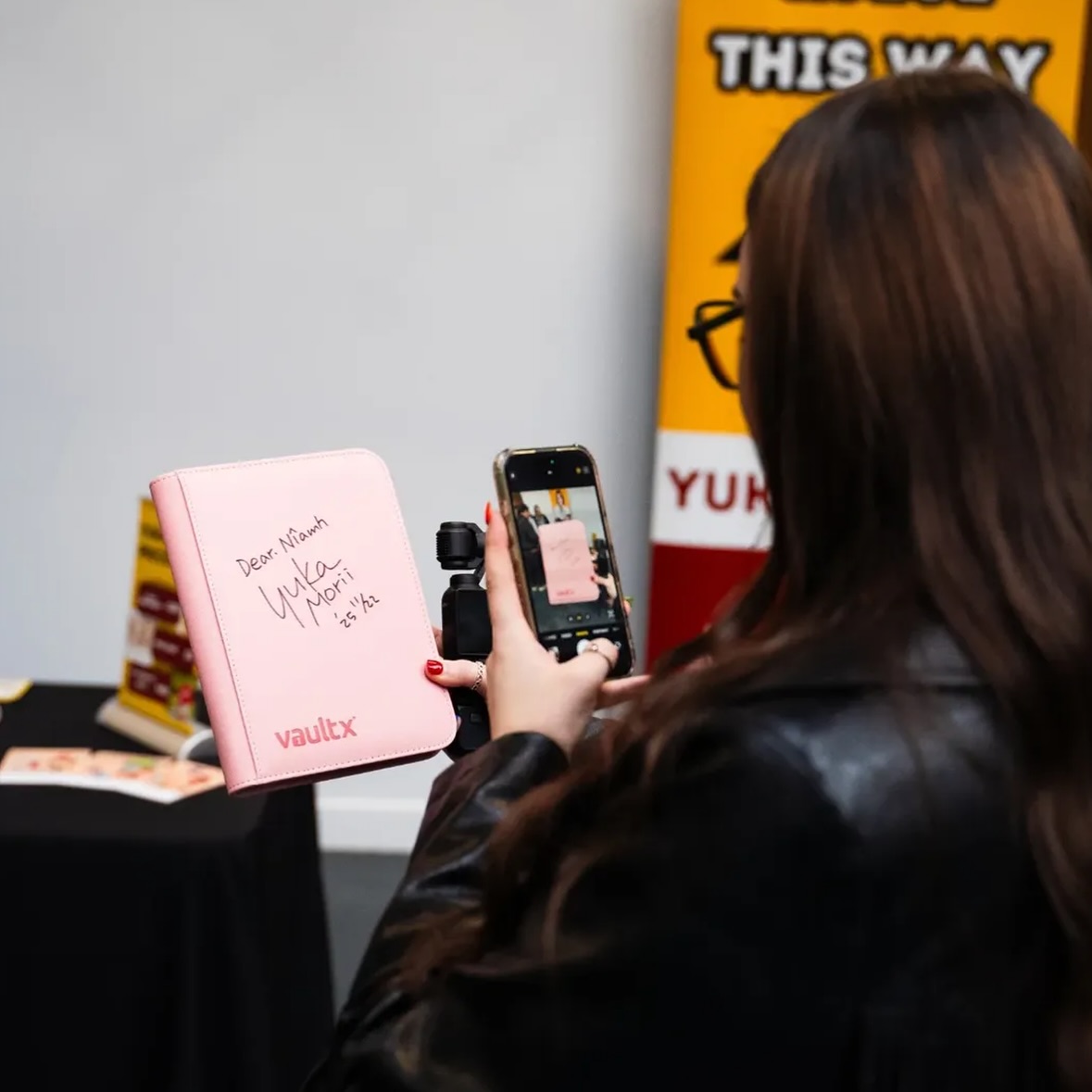 Instagram post by @nerdyniamh for Vault X. Caption reads: I have the best binder for my Yuka Morii....