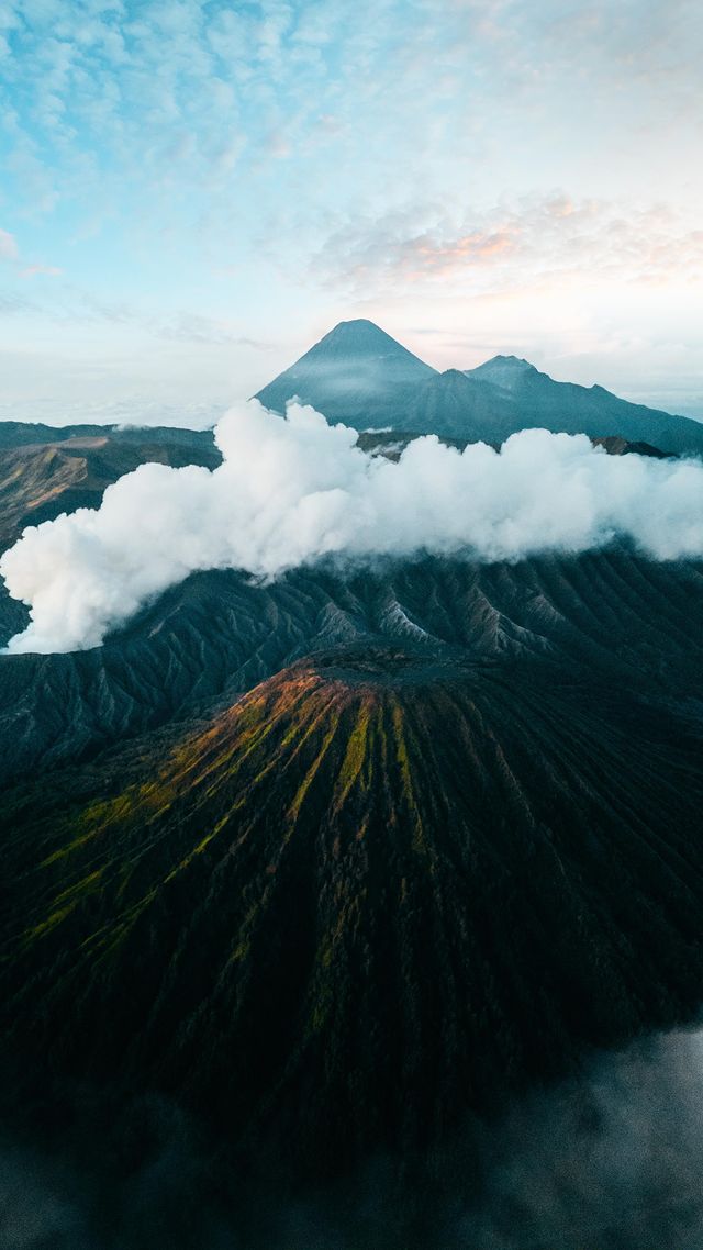 Instagram post by @furstset for National Geographic Travel. Caption reads: Bromo in East Java is a mesmerizing volcanic....
