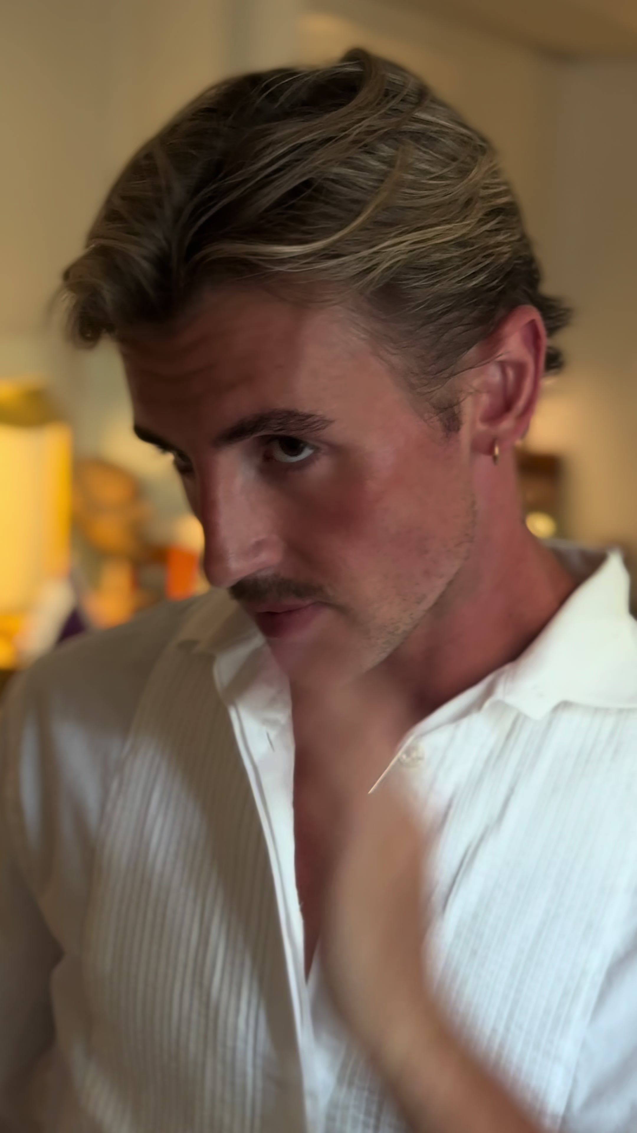 TikTok post by @jacobemile for The Perfume Shop. Caption reads: AD New York energy, London address. Wearing....