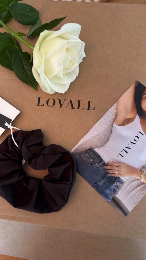 Instagram post by an influencer for LOVALL. Caption reads: Transitional outfit inspo 🍂 @lovallofficial....