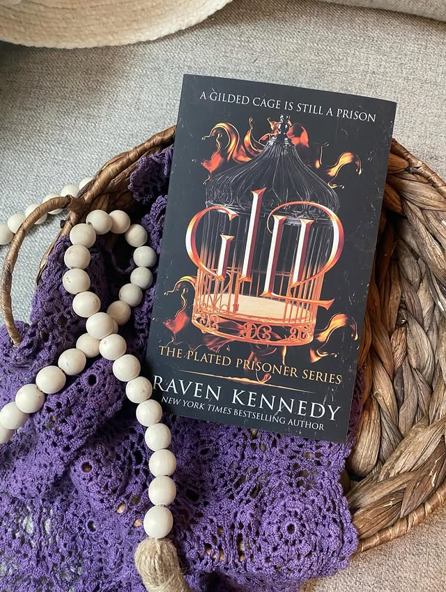 Instagram post by @page_turning_mama for Bloom Books. Caption reads: [...] prisoner series • Raven Kennedy • bloom....