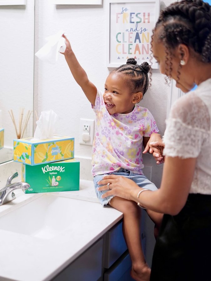 Instagram post by @millennialmommyboss for Family Dollar. Caption reads: #ad #KleenexPartner When life gets messy, I let....