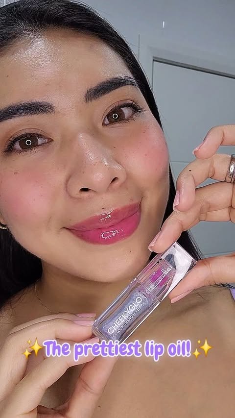 Instagram post by @glamwith.zee for Cheekyglo. Caption reads: I've been wearing this lip oil from CHEEKYGLO....