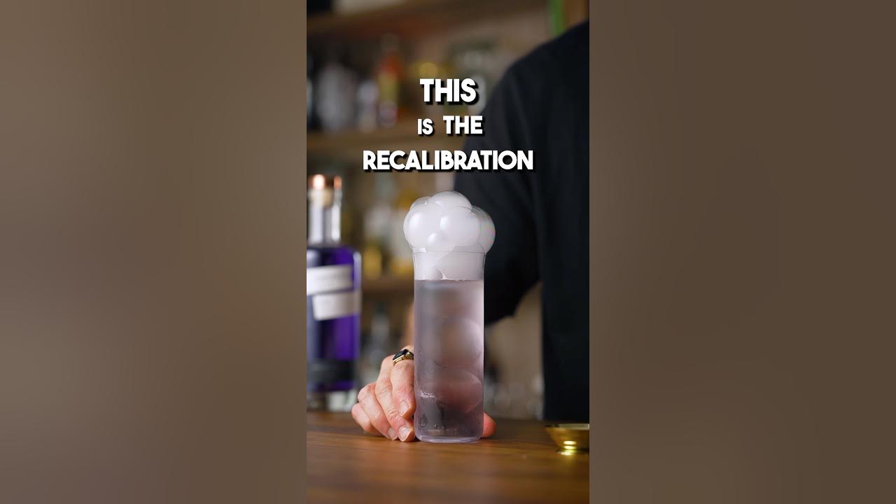 YouTube post by @TrufflesOnTheRocks for KLARIS. Caption reads: Mind Blowing Clarified Cocktail - The....