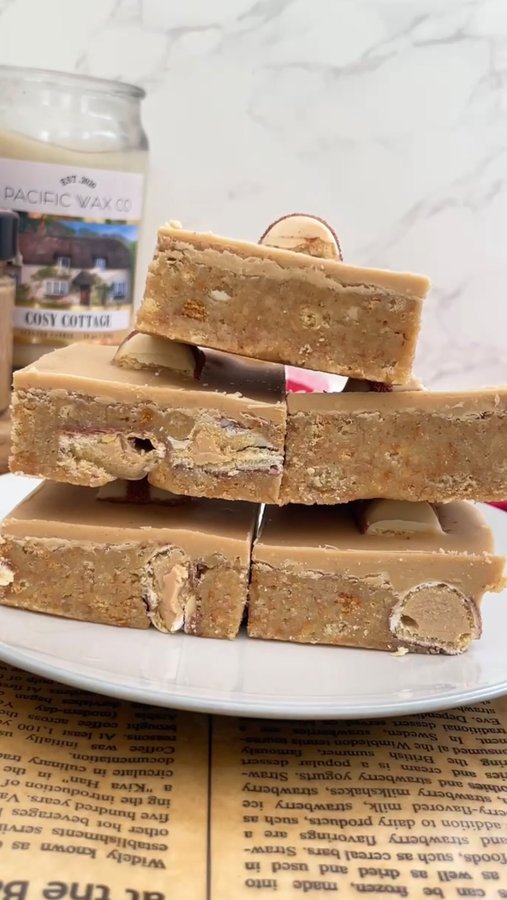 Instagram post by @sophsgoodies for Black Milk. Caption reads: These No Bake Kinder Bueno Bars are going to be....