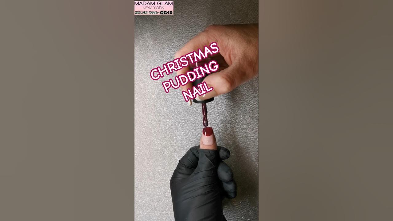 YouTube post by @NAILSWITHGG for Madam Glam. Caption reads: [...] Xmas nail art design, Ft. @madamglamofficial....