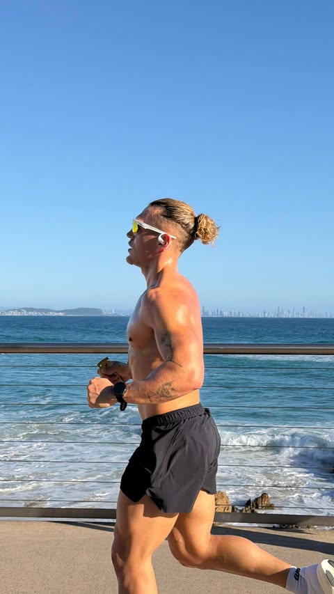 Instagram post by @mmoorefit for Shokz. Caption reads: [...] through that session without @shokzaunz,....