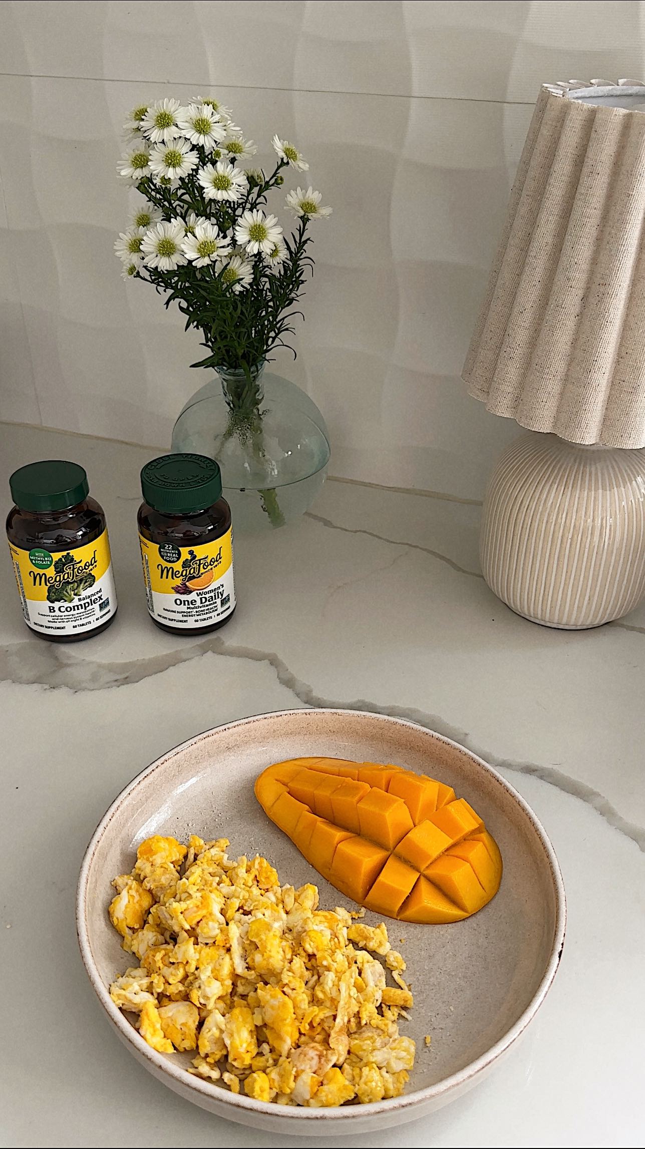 Instagram post by @emma.hussung for MegaFood. Caption reads: This season of my life is all about healing gently....