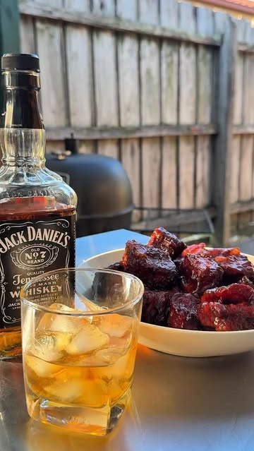 Instagram post by @brothersbbque for Jack Daniel's. Caption reads: [...] tender, then finished them in a rich....