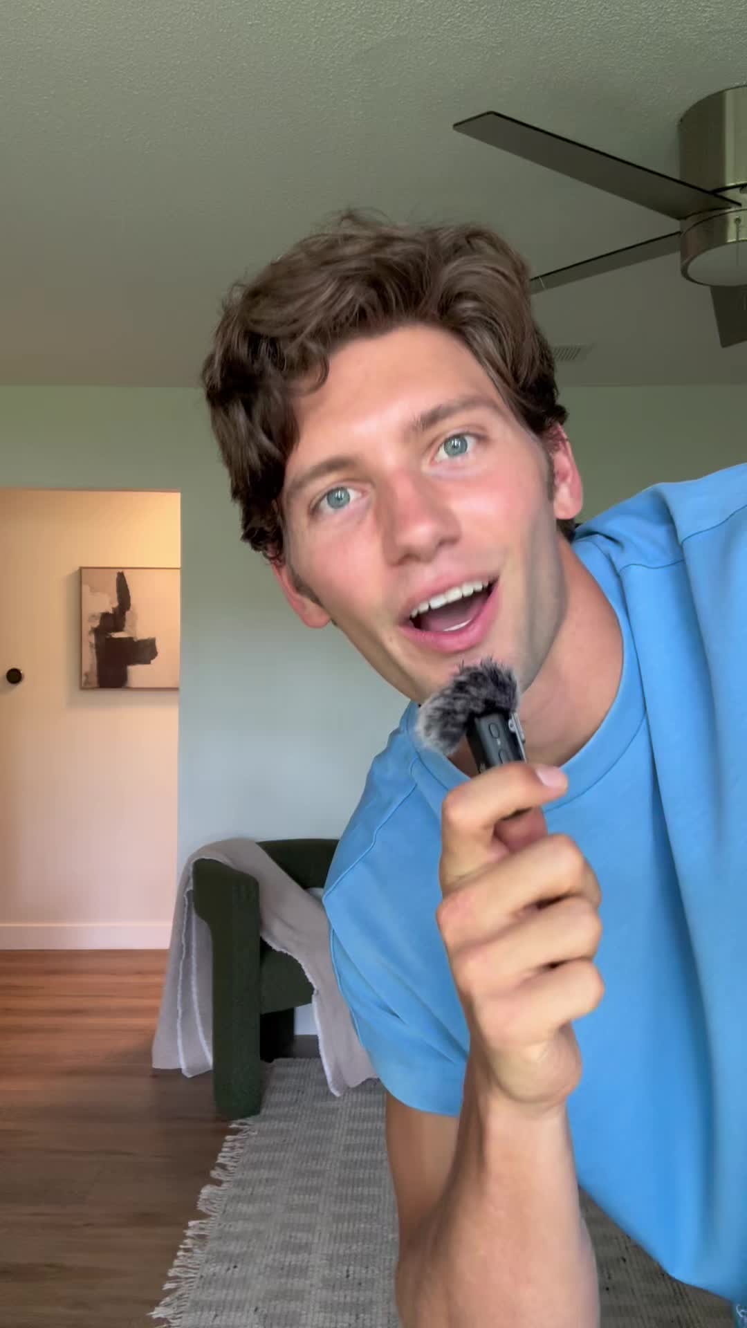 TikTok post by @austinhiller_ for Elwood Clothing. Caption reads: styling @Elwood newest summer drop 🤌🏼....