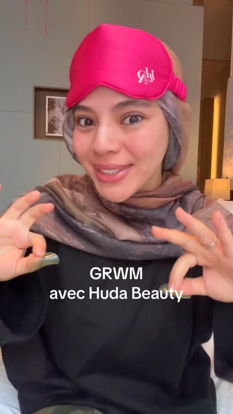Instagram post by @assiatique__ for HUDA BEAUTY. Caption reads: GRWM avec @hudabeauty (invitation) 💖.
