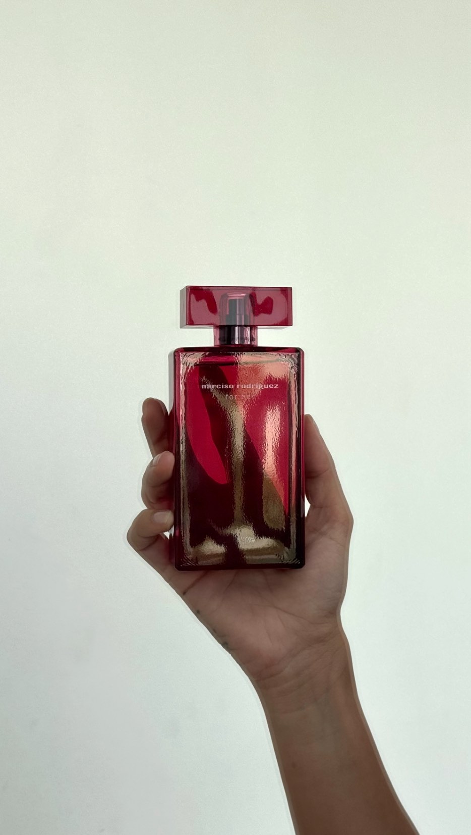 Instagram post by @dimasheikhly for narciso rodriguez. Caption reads: The new for her eau de parfum intense by....