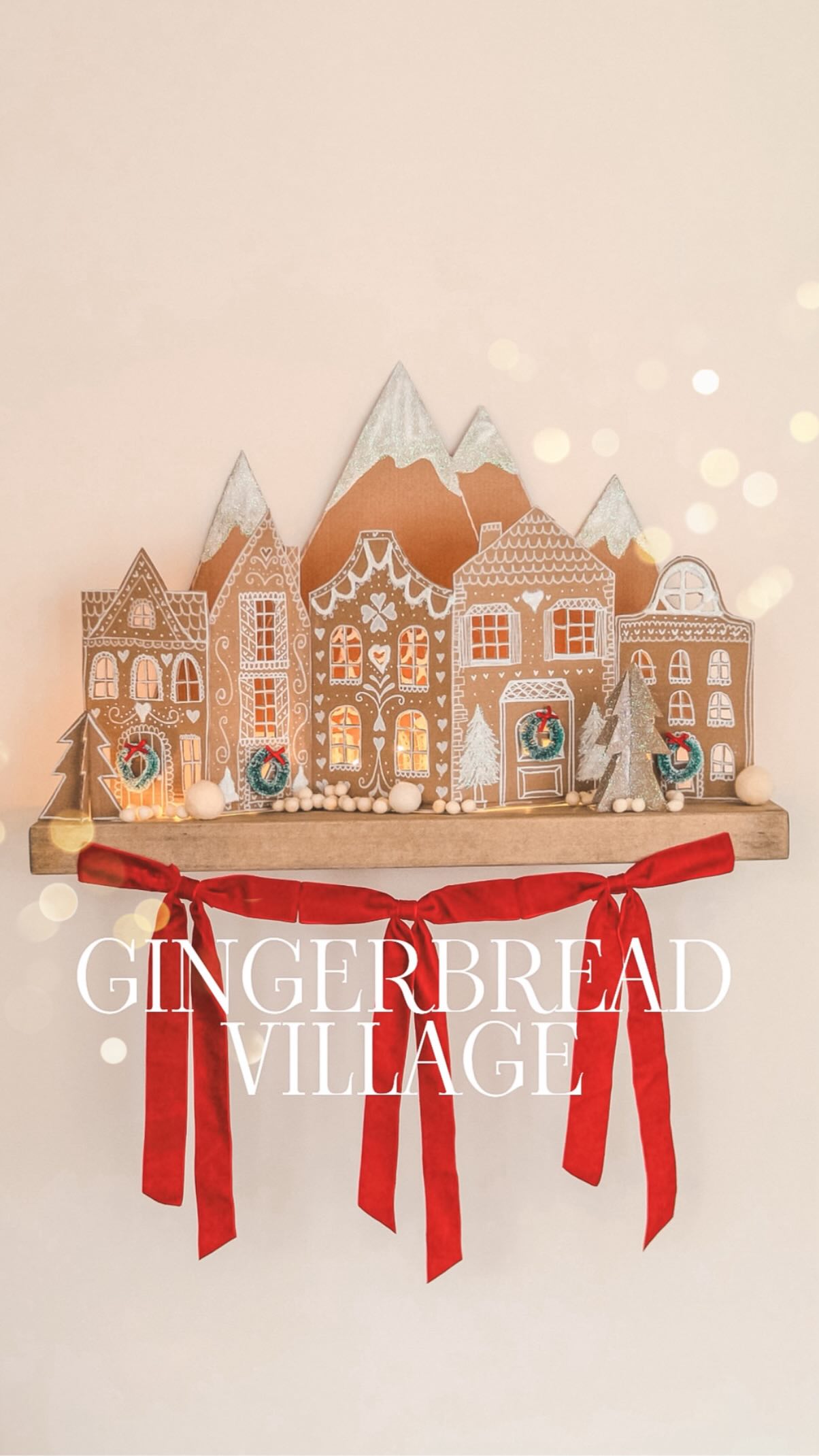Instagram post by @mummy_and_my_three for Baker Ross. Caption reads: Ad Gingerbread Village ✨ A Christmas Craft classic....