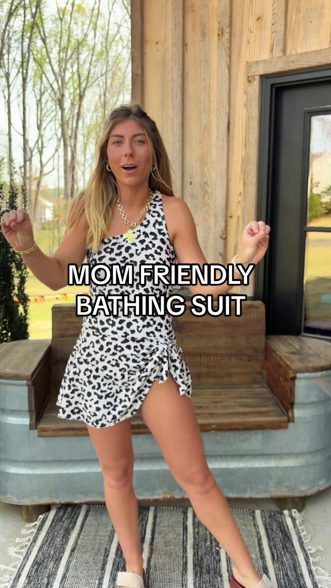 TikTok post by @theraesmith for Tempt Me Swimsuits. Caption reads: [...] this mom friendly bathing suit😍 @Tempt Me....