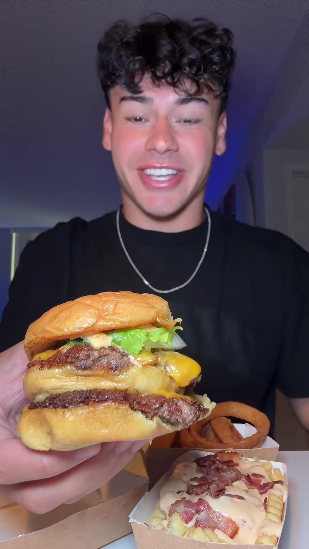 TikTok post by @dylan.mcarthur for Shake Shack. Caption reads: Shake Shack’s NEW Big Shack Burger #shakeshack....