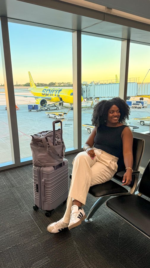 Instagram post by @_asipoftee_ for Spirit Airlines. Caption reads: [...] ⬇️

We flew out of Atlanta with....