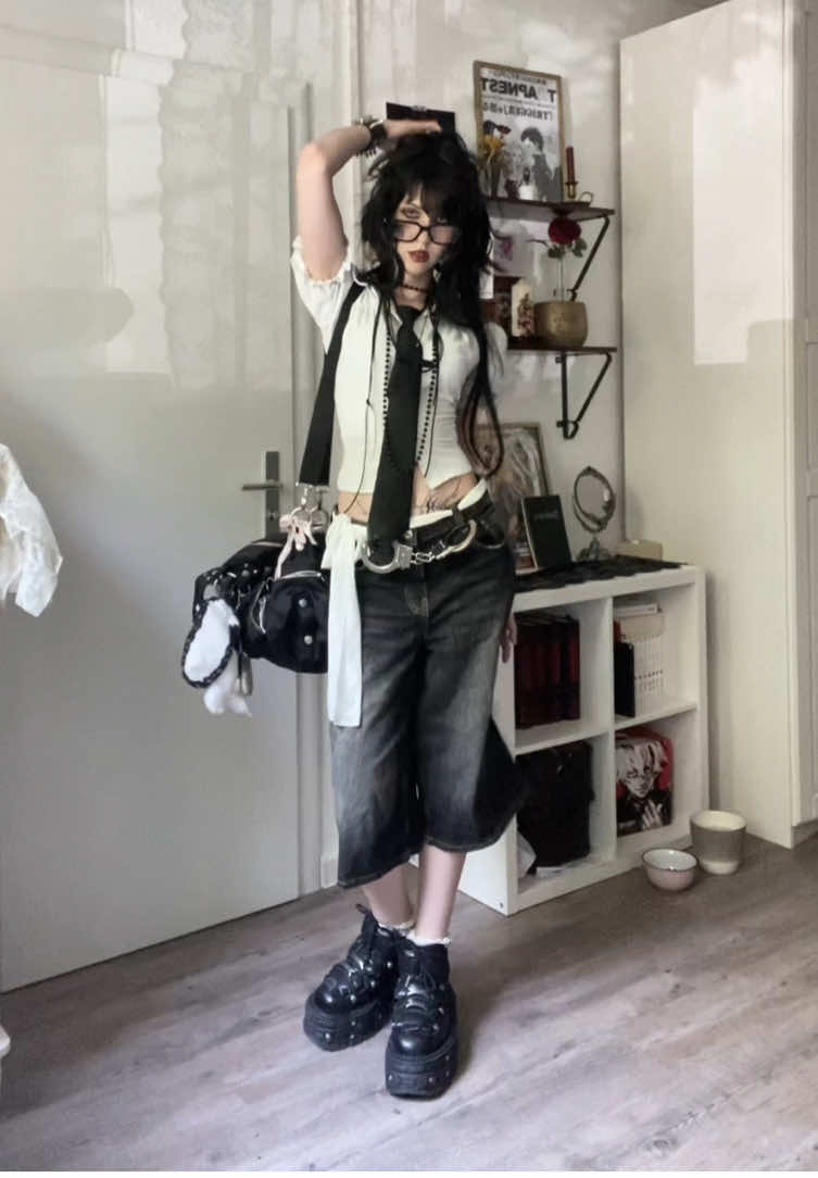 TikTok post by @bl00dy.maryxx for TIJN Eyewear. Caption reads: grwm <3 glasses are from @TIJN EYEWEAR....