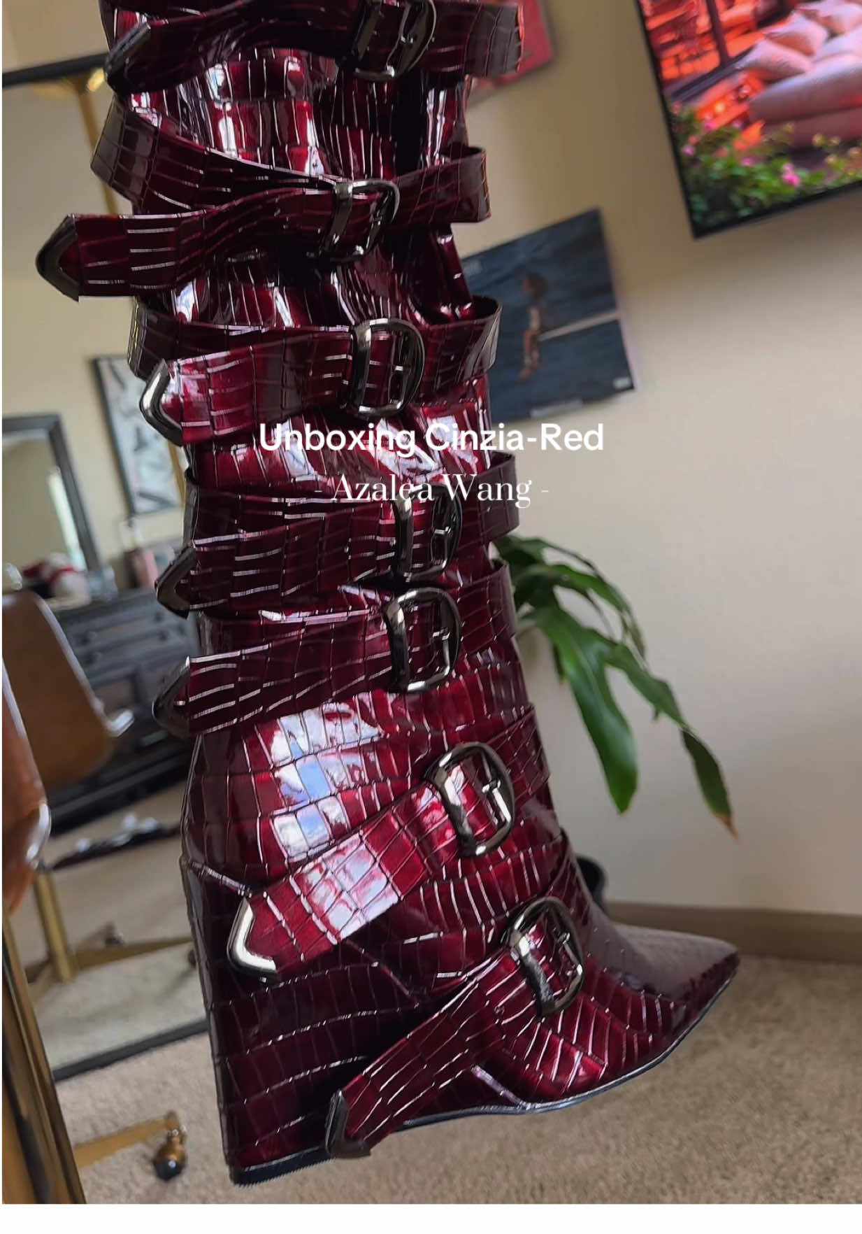 TikTok post by @blackqueenc_ for AZALEA WANG. Caption reads: [...] a good boot before fall/winter. @Azalea Wang....