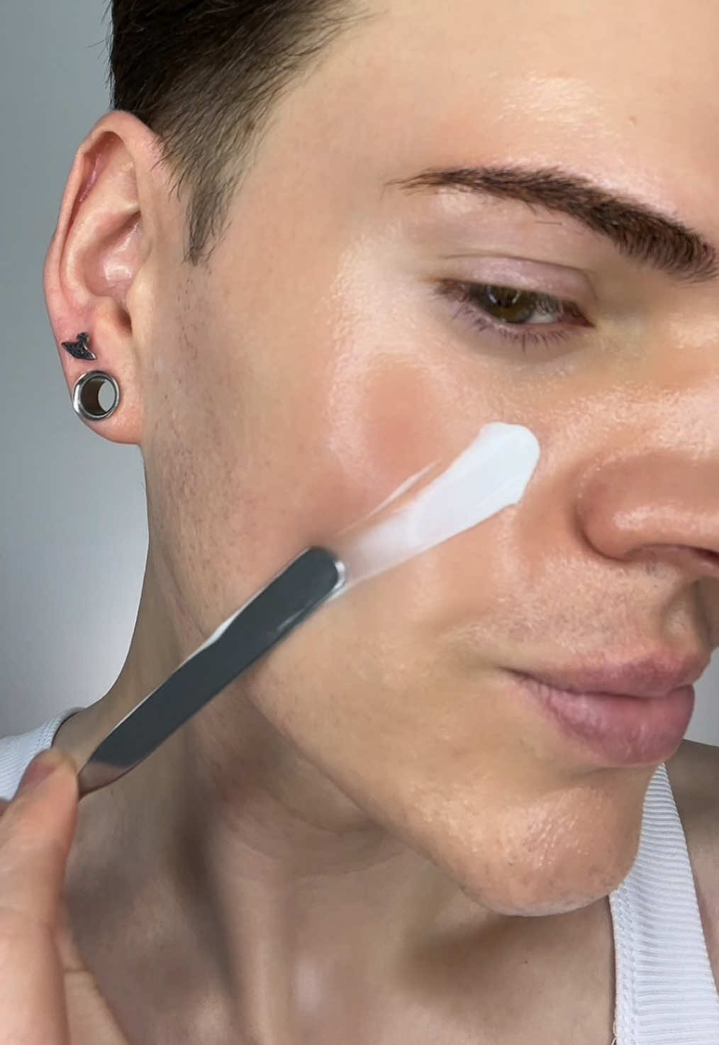 TikTok post by @joshwastjames for Glow Is Here. Caption reads: No matter where I go, my glow routine travels....