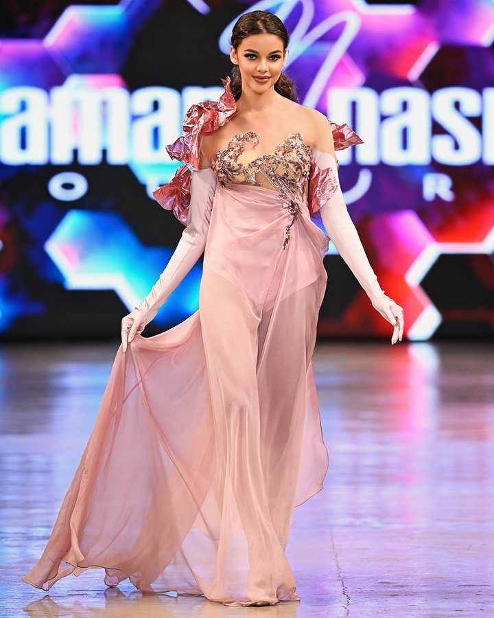 Instagram post by @tamaranasrofficial for Black Radiance Beauty. Caption reads: “A whisper of silk, a bloom in motion—this dress....