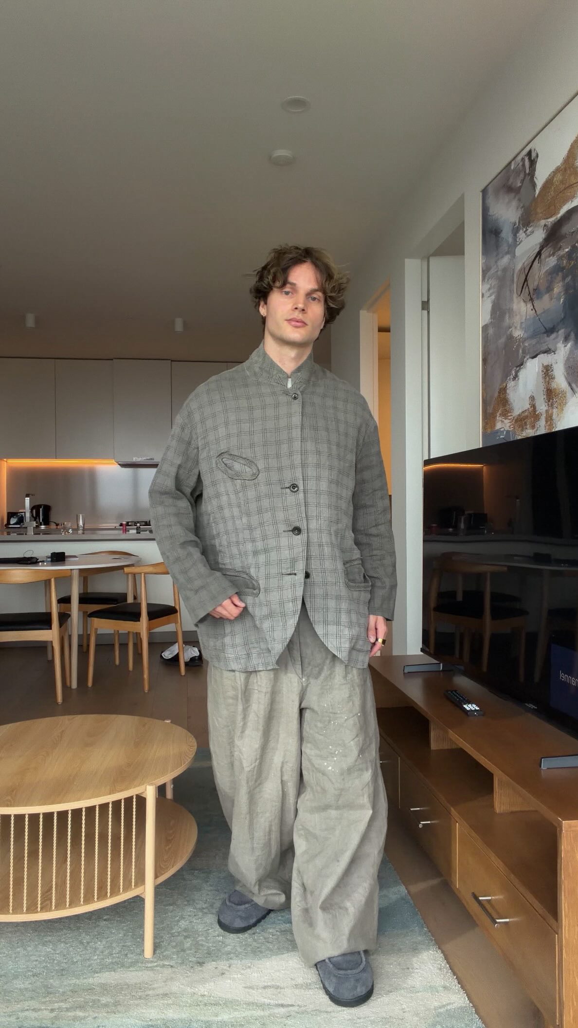 Instagram post by @joefletcherau for JW ANDERSON. Caption reads: The viral @uniqloau × @jw_anderson collab is back....