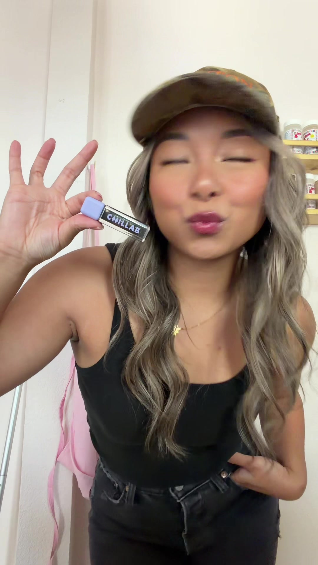 TikTok post by @lookatlyssa for Chillab. Caption reads: Trying out the @CHILLAB USA Magic Black Lip....