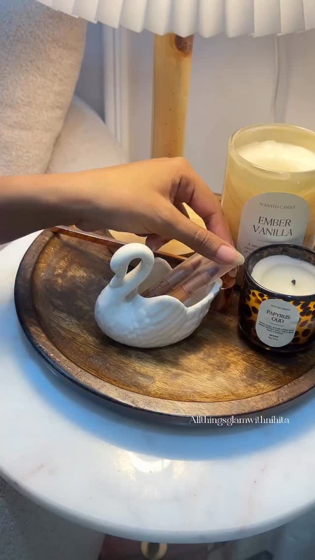 Instagram post by @allthingsglamwithnikita for Juicy Chemistry. Caption reads: These lip and cheek crayons glide on like butter....