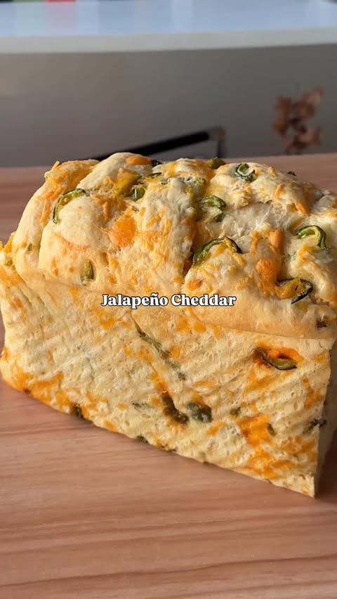 Instagram post by @shityoushouldeat for King Arthur Baking Company. Caption reads: Jalapeño Cheddar Pull Apart Bread

Soft, fluffy....