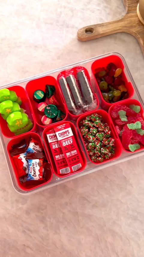 Instagram post by @organizewithrosie for Chomps. Caption reads: Holiday snack box 🎅🎄🎁❄️ #christmas #restock....