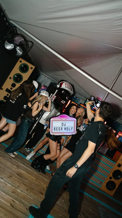 Instagram post by @marisaquinnn for Coors Light. Caption reads: [...] favorite new DJ #DJBeerWolf Follow....