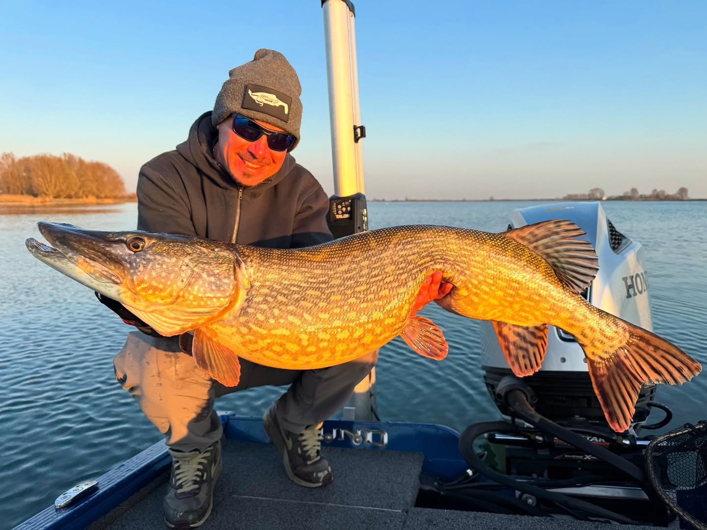 Instagram post by @tropicfishing for ShimanoFishing Japan. Caption reads: A beautiful and properly fat pike 117cm🐊
 My....