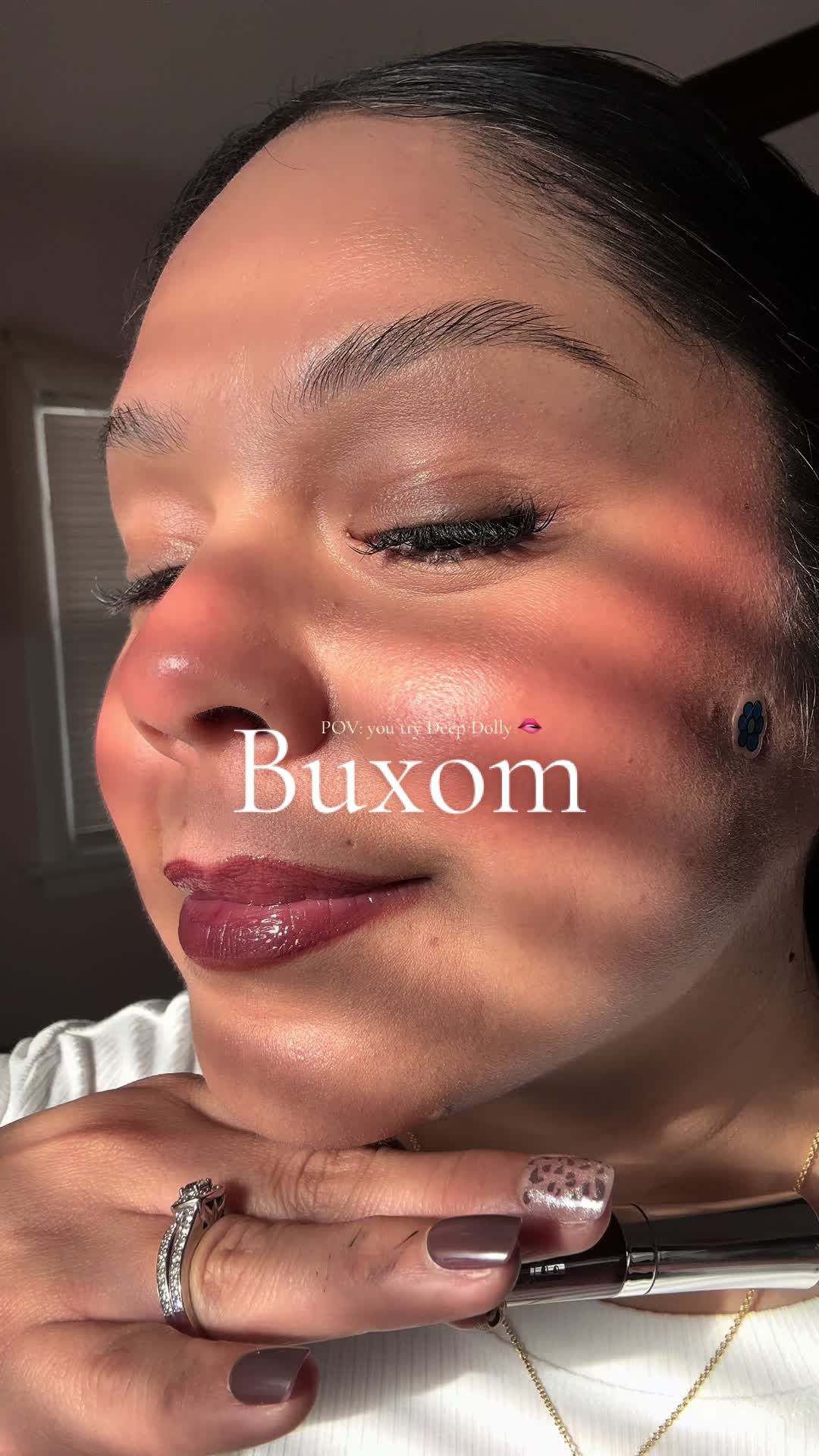 TikTok post by @dgarcia4522 for BUXOM Cosmetics. Caption reads: [...] #LipGlossTok #MakeupTikTok  @buxomcosmetics .