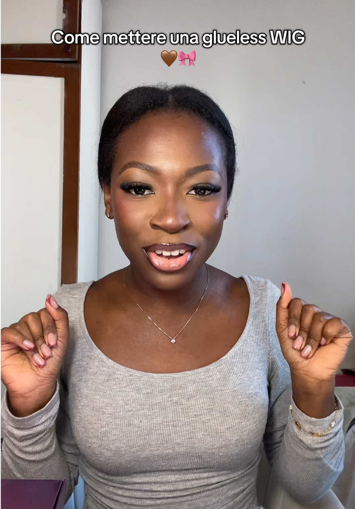 TikTok post by @emmaakenten for WigFever. Caption reads: Come la chiamiamo Naomi o Nicky??😂❤️💅🏾....