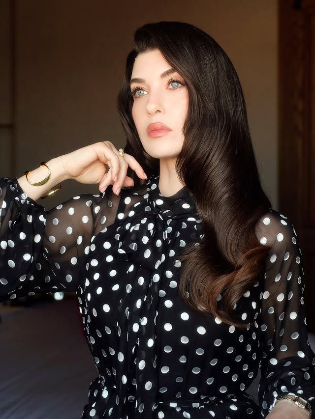 Instagram post by @aslihanguner for Carolina Herrera. Caption reads: [...] Styling @yukselozgur Look @carolinaherrera....