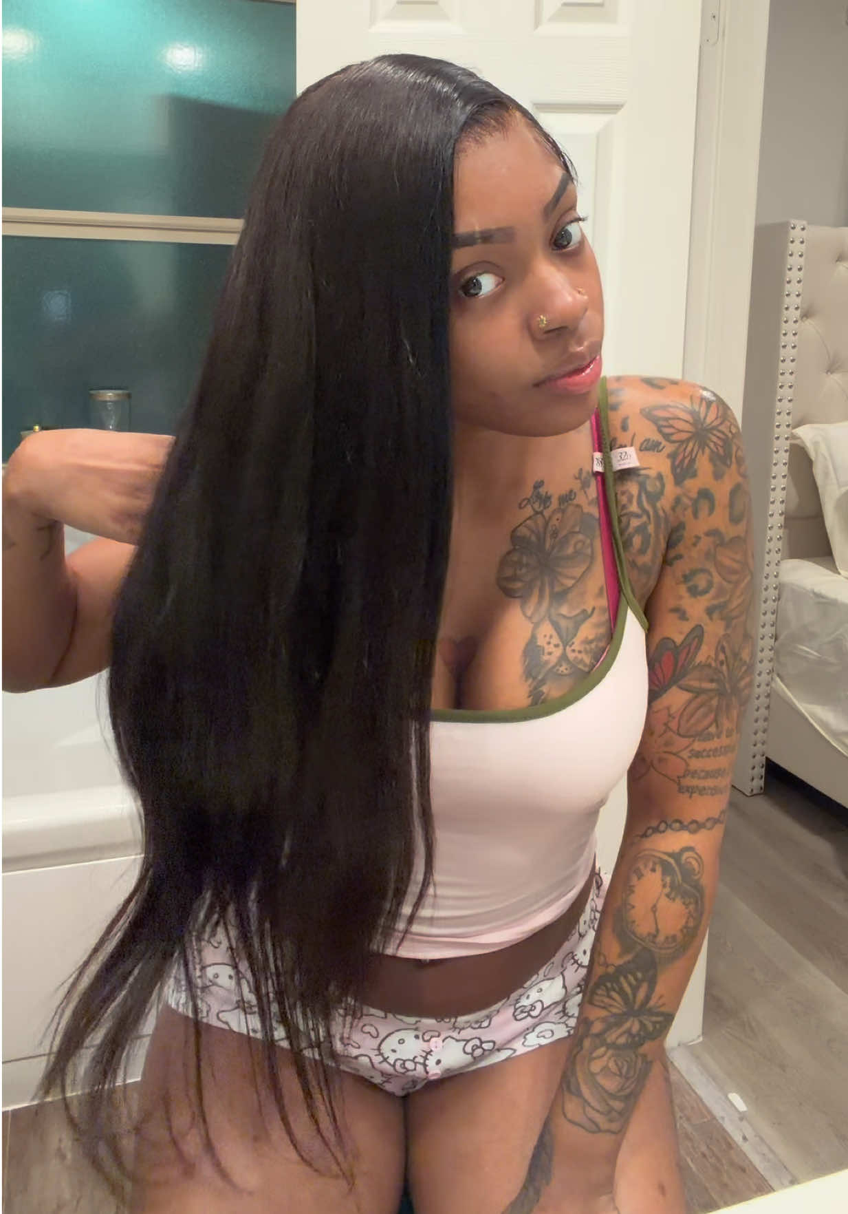TikTok post by an influencer for Luvme Hair. Caption reads: Silkiest hair yet😍. @Luvmehair 28% discount code：....