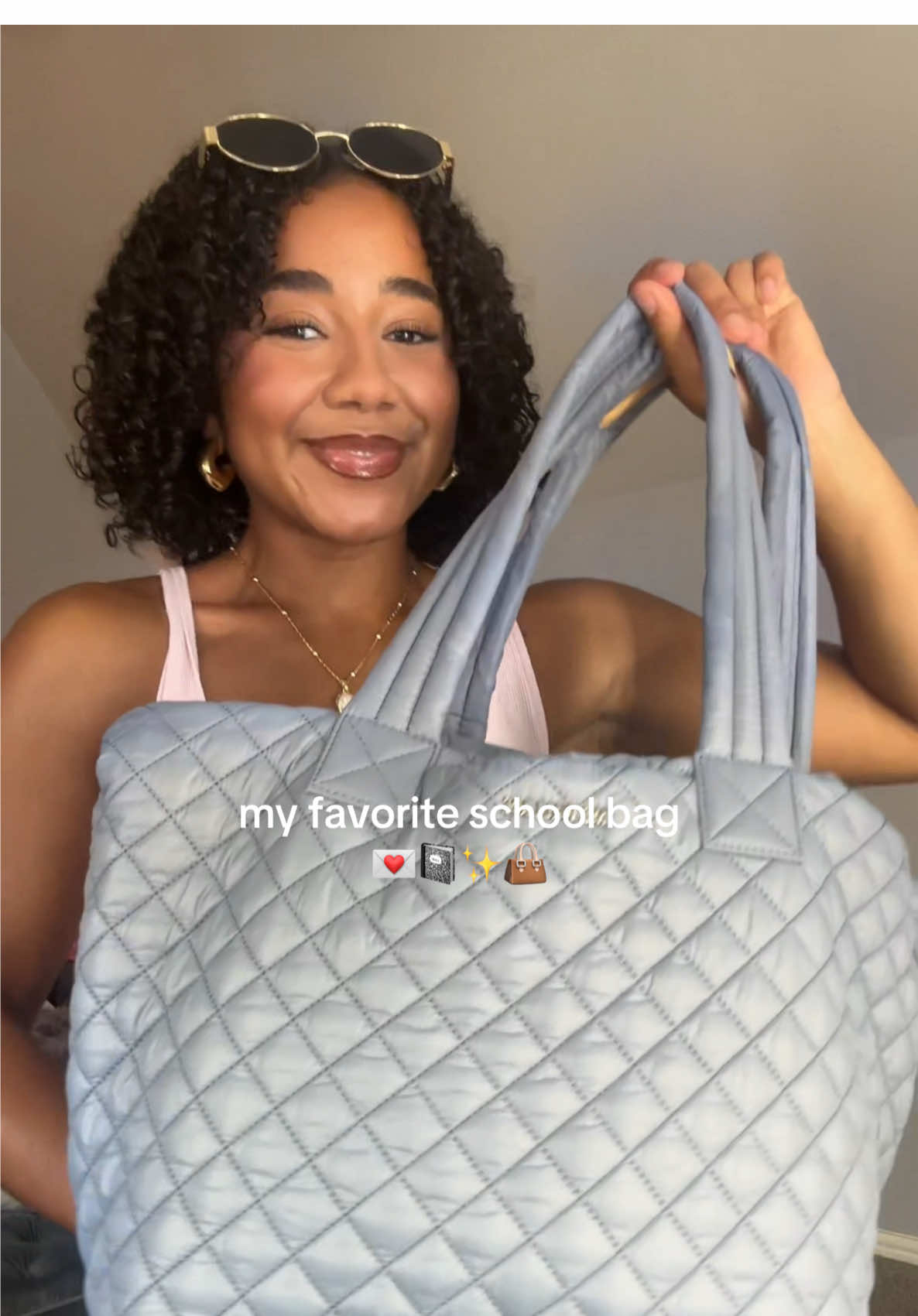 TikTok post by @mia.dorsett for MZ Wallace. Caption reads: Back to school with @MZ Wallace !! ✨📓🤍👜 #ad....
