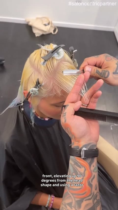 Instagram post by @philipwolffhair for Bumble and bumble.. Caption reads: A baby fringe isn’t “just bangs”… it’s precision,....