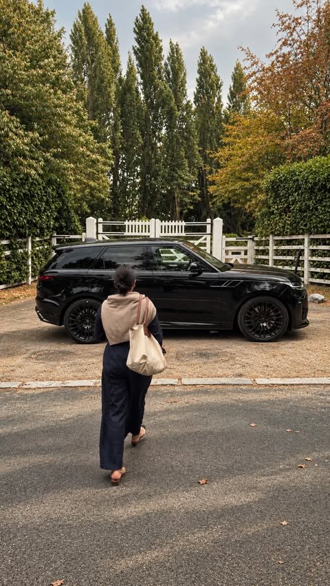 Instagram post by @poonamwalid for Range Rover. Caption reads: [...] is definitely your kind of car. 🤎....