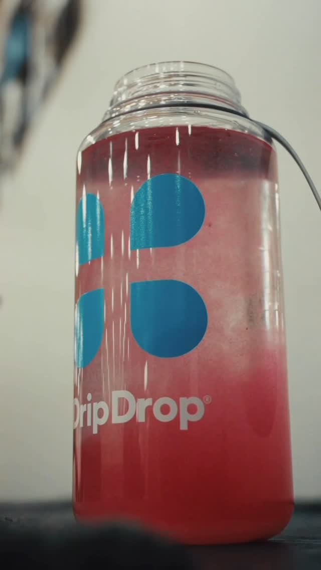 Instagram post by @andijacksonn for DripDrop. Caption reads: Locked in and staying hydrated through every....