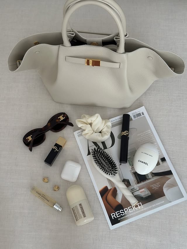 Instagram post by @interior_by_helen_wizemann for Aesop. Caption reads: White bags just hit different in summer 🤍 My top....