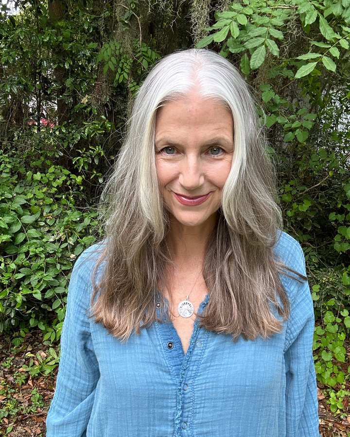Instagram post by @margaretaginggrayfully for Natural Life. Caption reads: Got a couple of inches trimmed off my hair....