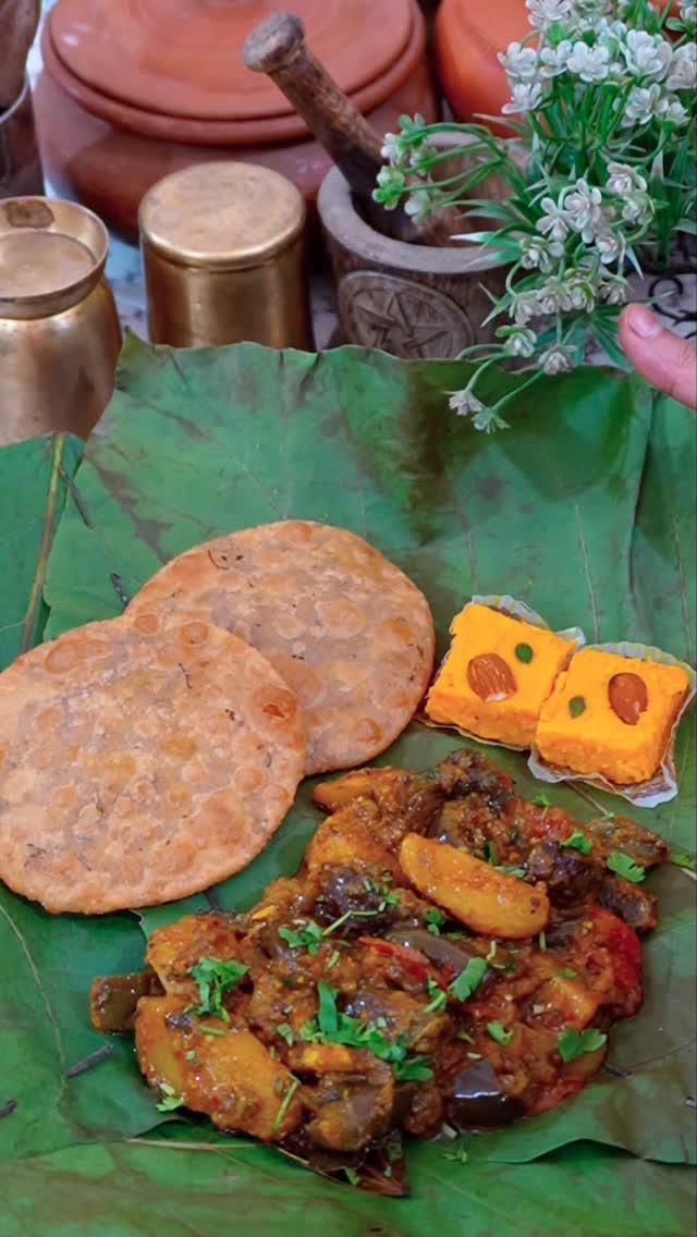 Instagram post by @cuisineculture_by_akriti for Emami Healthy & Tasty. Caption reads: UP Bihar Ki Biya Ke Bhoj Waali Baigan Aloo Badi....