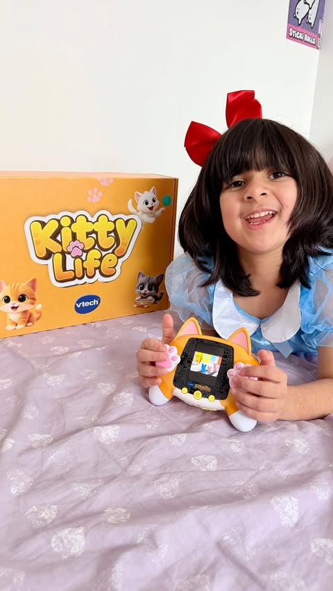 Instagram post by @ayanaandsiblingz for VTech USA. Caption reads: A virtual kitty she can take everywhere! 🎮....